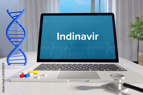 Indinavir. Laptop mit Begriff/Text auf Monitor. Computer von Arzt. DNA und Stethoskop. Medizin, Gesundheitswesen photo