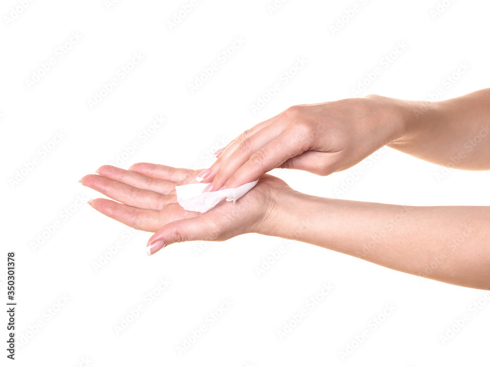 Female hands with a wet wipes, close up. Caucasian woman cleaning her fingers, isolated on white Female hands with a wet wipes, close up. Caucasian woman cleaning her fingers, isolated on white