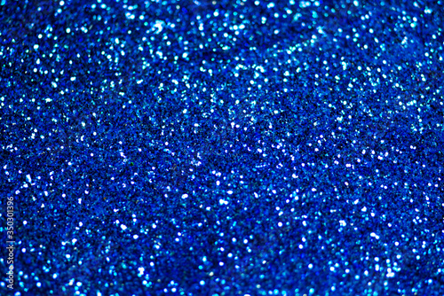 Glitter light abstract blue bokeh light background