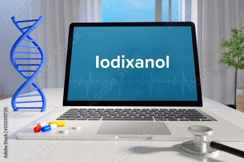 Iodixanol. Laptop mit Begriff/Text auf Monitor. Computer von Arzt. DNA und Stethoskop. Medizin, Gesundheitswesen photo