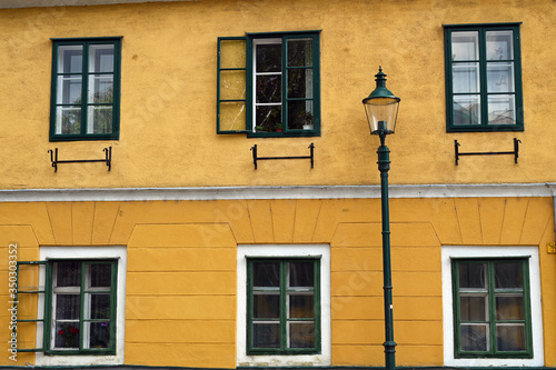 old house wall and street lantern in Grinzing Vienna