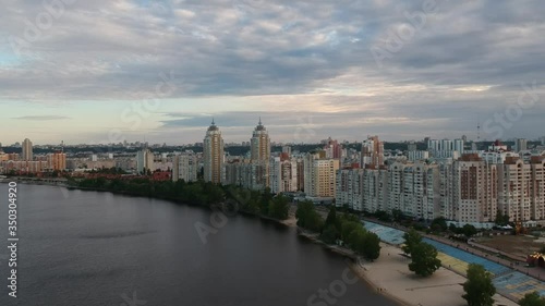 Wallpaper Mural Aerial photography. Obolonskaya embankment in the spring in Kiev. Many houses built along the Dnieper Bay. Drone. Torontodigital.ca