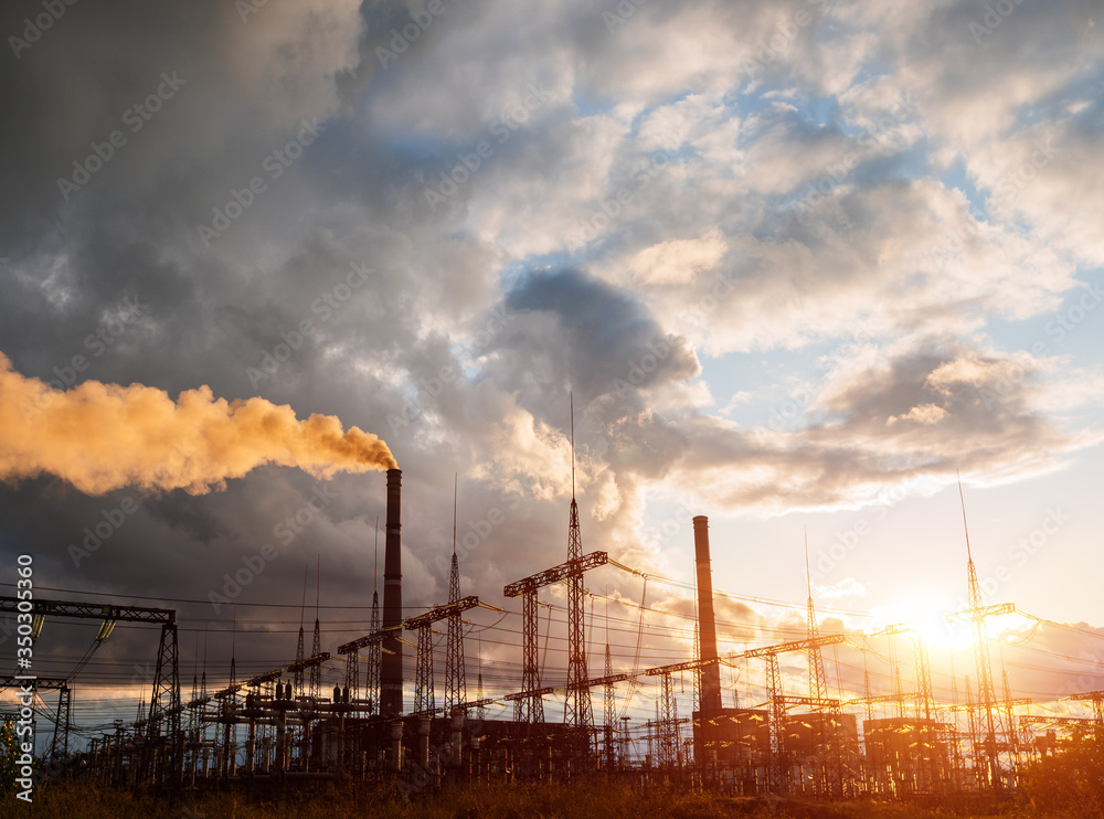 Thermal power stations and power lines during sunset. Thermal power stations and power lines during sunset.