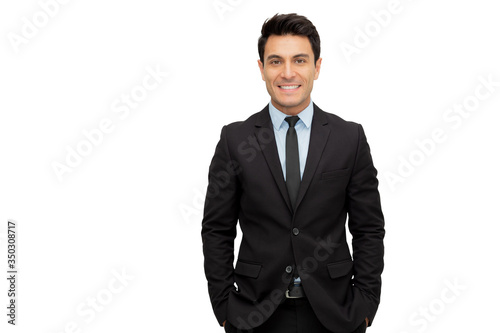 Photo Portrait of a charming businessman dressed in suit and looking at camera isolate