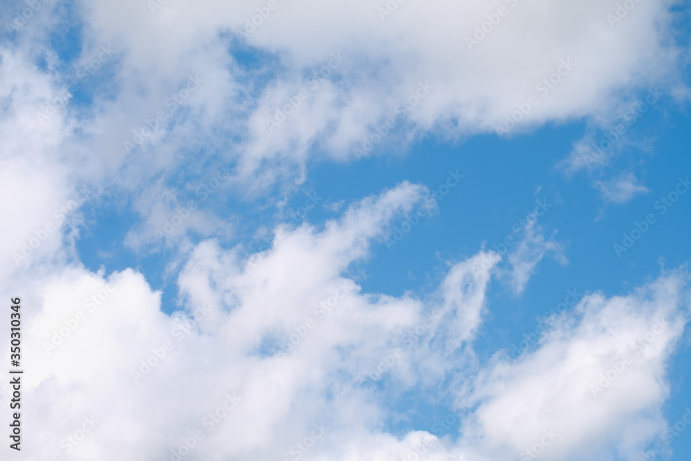 Cumulus clouds floating across the sky. Background image. Cumulus clouds floating across the sky. Background image.