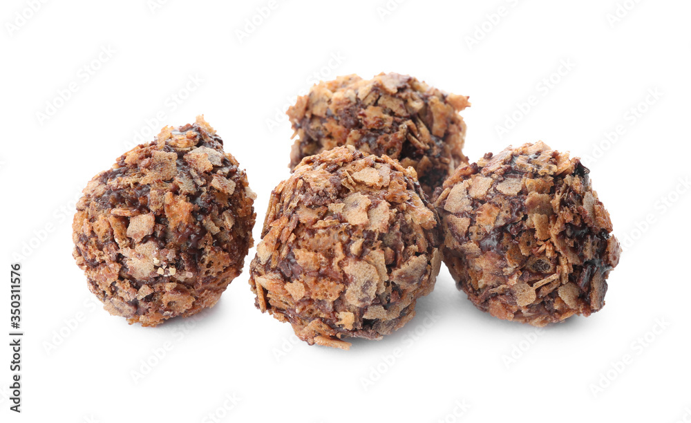 Delicious chocolate candies with waffle crumbles isolated on white Delicious chocolate candies with waffle crumbles isolated on white