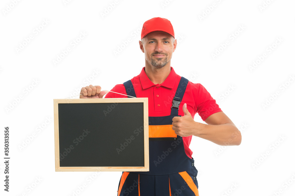 He loves his job. male worker in cap hold blackboard. board for copy space. builder service advertisement. best offer ever. move out or relocation loader. qualified repairman offers his services He loves his job. male worker in cap hold blackboard. board for copy space. builder service advertisement. best offer ever. move out or relocation loader. qualified repairman offers his services