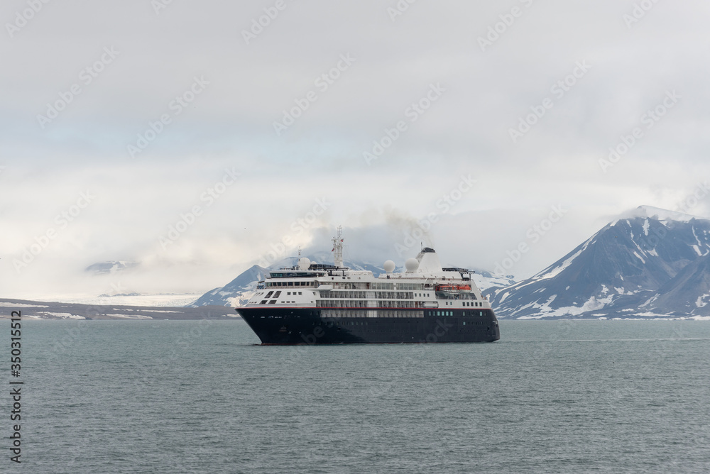 Expedition ship in Arctic sea, Svalbard. Passenger cruise vessel. Arctic and Antarctic cruise. Expedition ship in Arctic sea, Svalbard. Passenger cruise vessel. Arctic and Antarctic cruise.