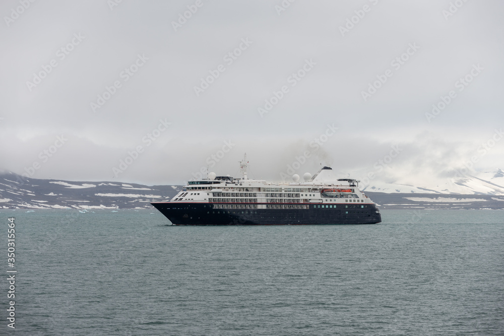 Expedition ship in Arctic sea, Svalbard. Passenger cruise vessel. Arctic and Antarctic cruise. Expedition ship in Arctic sea, Svalbard. Passenger cruise vessel. Arctic and Antarctic cruise.