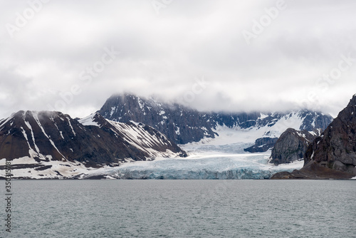 Arctic landscape in Svalbard with glacier © Alexey Seafarer