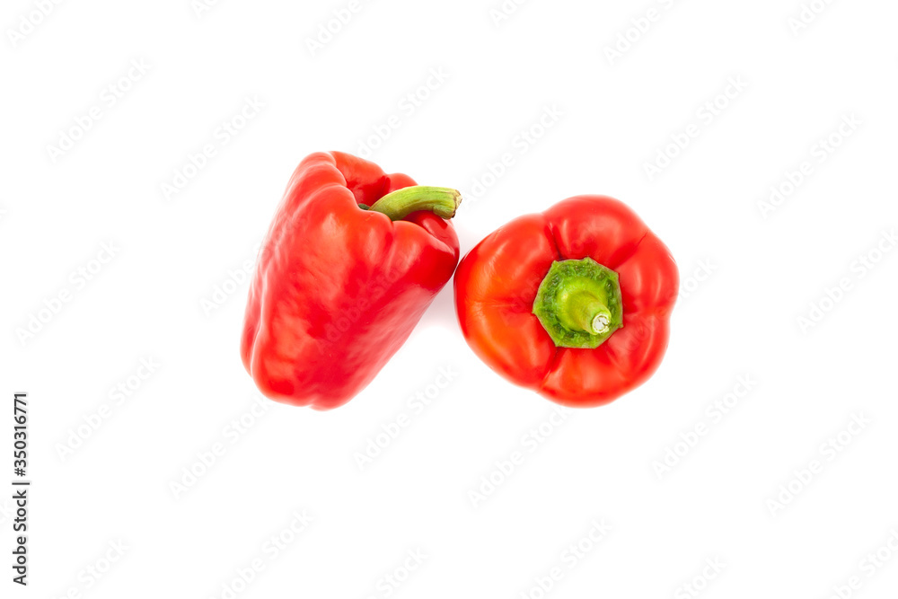 Two fresh peppers isolated on white background. Red sweet paprika isolated. Two fresh peppers isolated on white background. Red sweet paprika isolated.