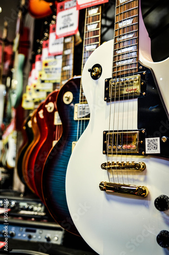 multiple electric guitars at music shop