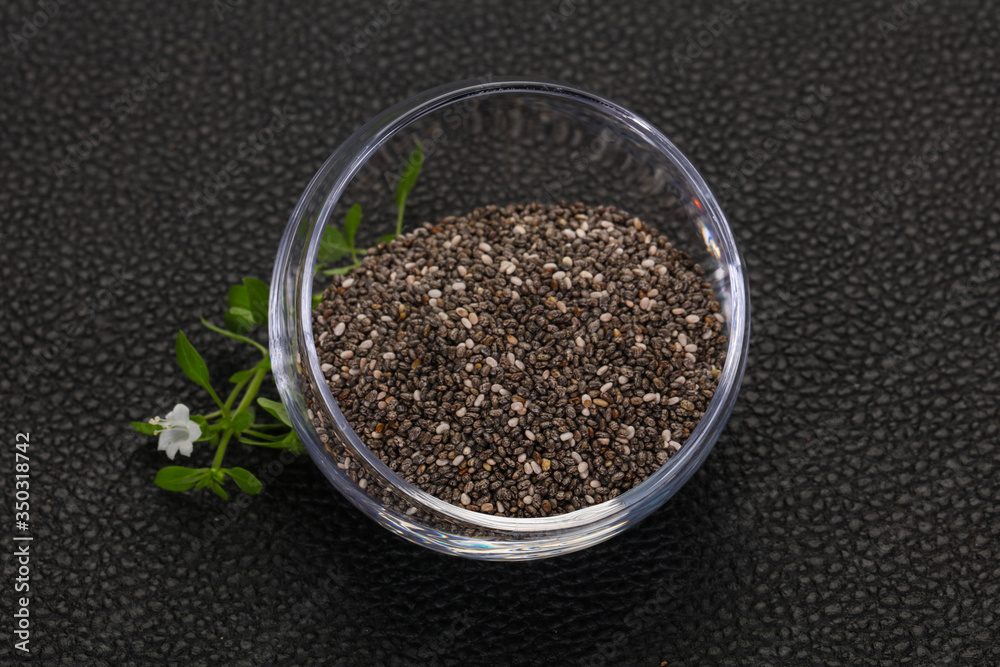 Dietary Chia seeds in the bowl Dietary Chia seeds in the bowl