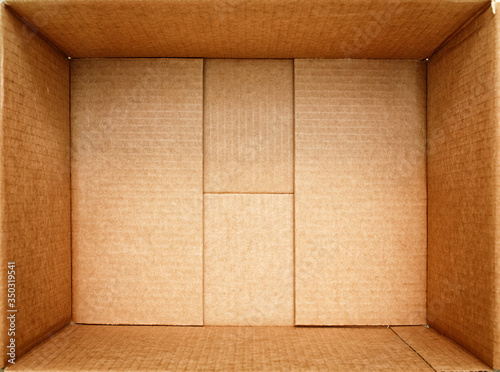 Open box for things. Empty open cardboard box close-up. Packing for cargo.