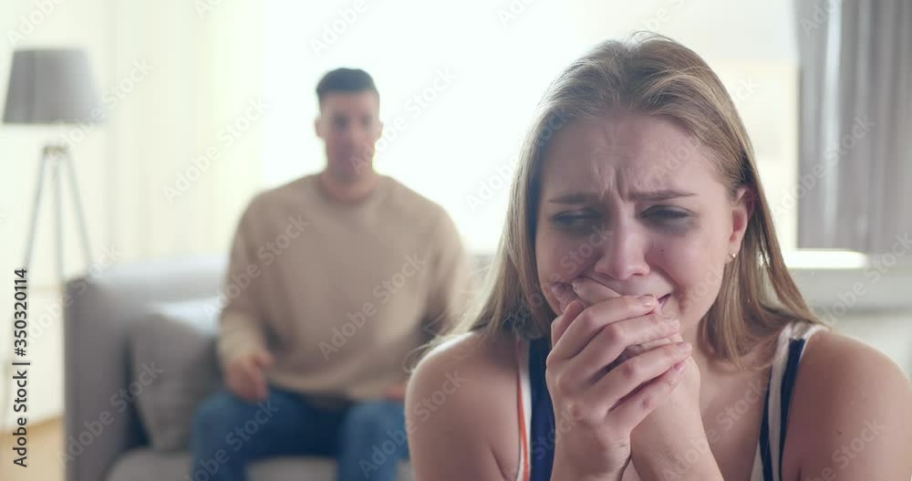 Couple having argument in living room at home. Relationship problems Couple having argument in living room at home. Relationship problems