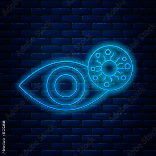 Glowing neon line Reddish eye due to virus, bacterial or allergic conjunctivitis icon isolated on brick wall background. Vector Illustration
