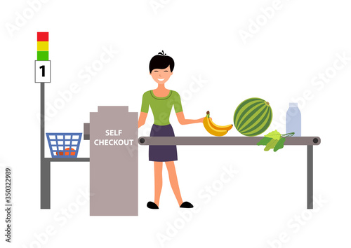 Self-service cashier or terminal. Woman customer shopping in self checkout supermarket.
