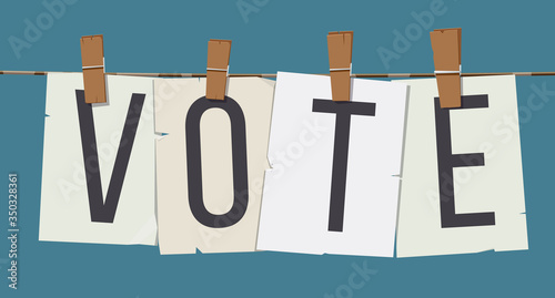 Word "Vote" attached with hairpins