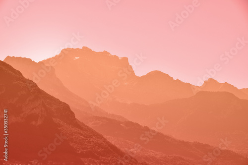 Billede på lærred Sunset aerial perspective mountain landscape