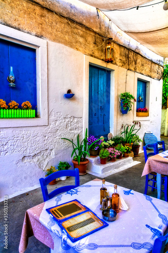 Typical street restaurants (taverns) of Greece. Paxos. Ionian island of Greece © Freesurf