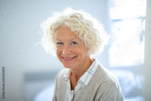 Close up attractive old woman smiling