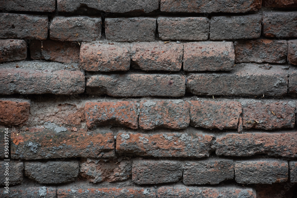 Dark weathered cement brick texture