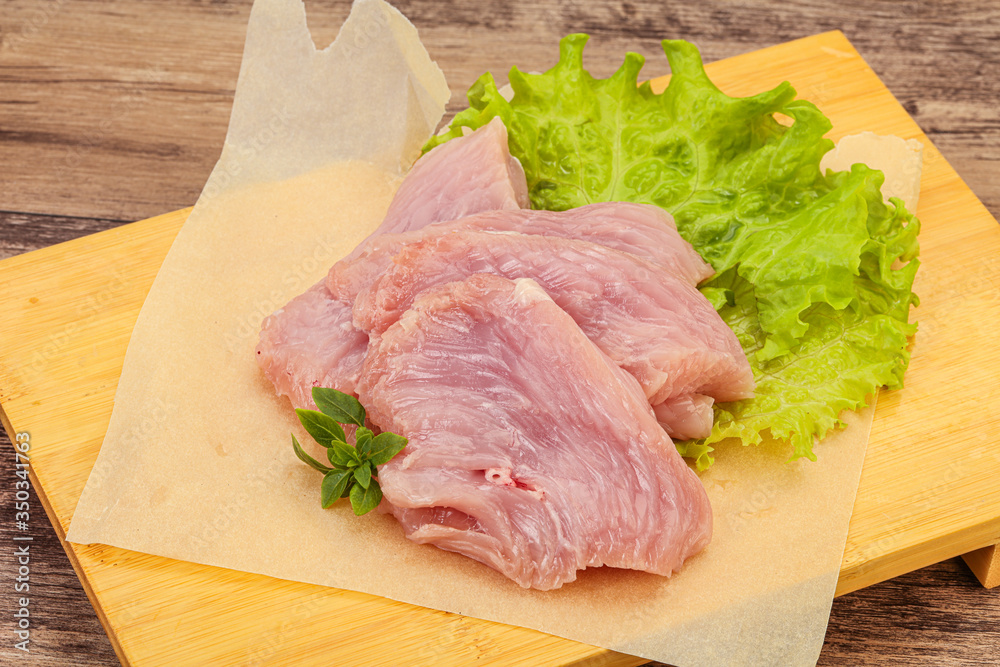 Raw turkey breast steak for cooking Raw turkey breast steak for cooking