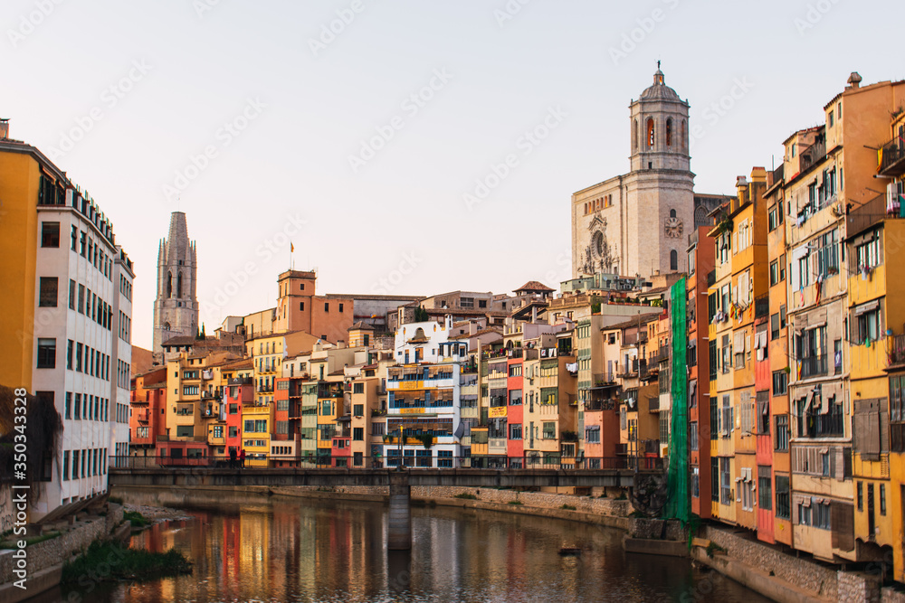 Girona during the isolation due to the coronavirus. Houses around the river Onyar.