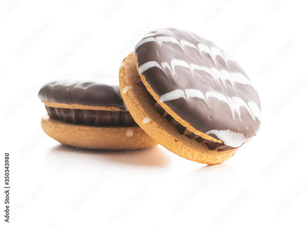 Sweet dessert with chocolate cream and chocolate icing Sweet dessert with chocolate cream and chocolate icing