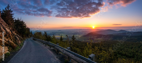 Sunrise sunset over the city of Liberec  Czech republic. Jested. View of the path leading to the sun.
