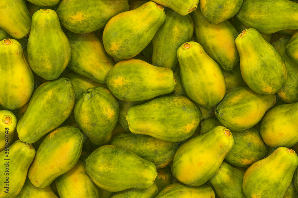 Background from papayas, top view. 3D rendering Background from papayas, top view. 3D rendering