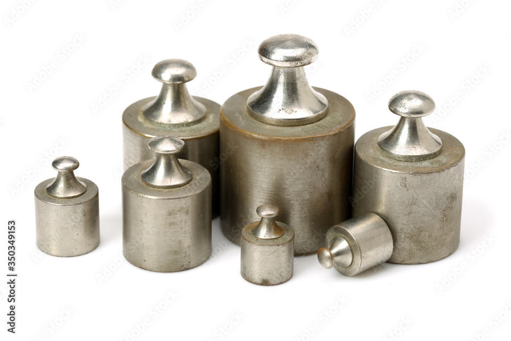 Calibration weights isolated on a white background. Calibration weights isolated on a white background.