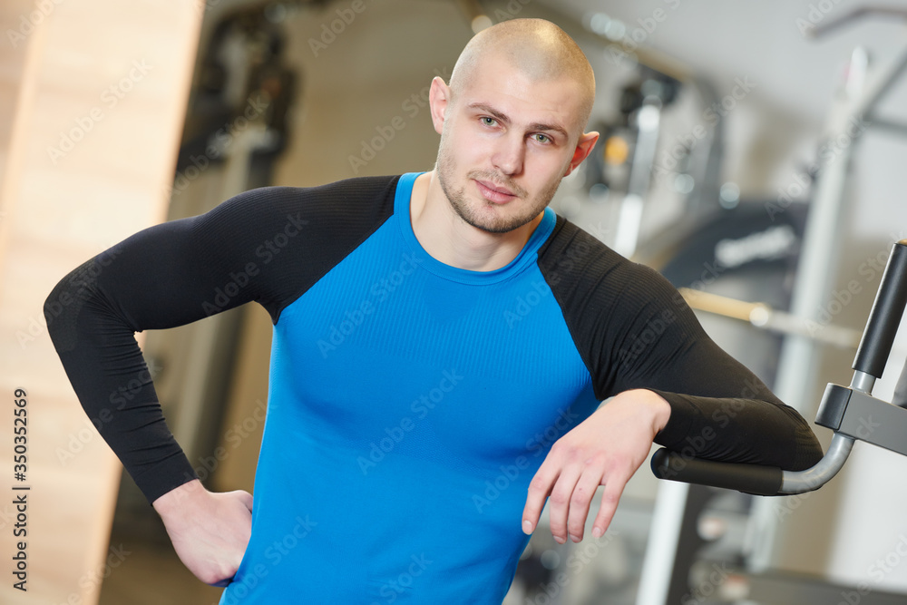 male fitness trainer at gym