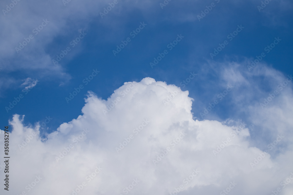 Cumulus Clouds On Blue Sky Close Up. Cumulus Clouds On Blue Sky Close Up.