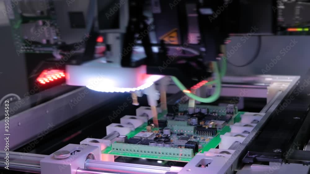 Automated technology, industrial, robotic, electronic, production, manufacturing concept. Automation machine equipment for quality testing of printed circuit boards - flying probe test at factory. Automated technology, industrial, robotic, electronic, production, manufacturing concept. Automation machine equipment for quality testing of printed circuit boards - flying probe test at factory.