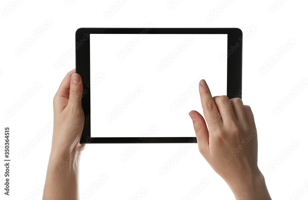 Woman using tablet computer with blank screen on white background, closeup. Modern gadget Woman using tablet computer with blank screen on white background, closeup. Modern gadget