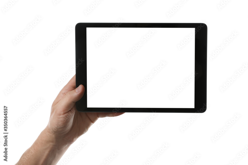 Man holding tablet computer with blank screen on white background, closeup. Modern gadget Man holding tablet computer with blank screen on white background, closeup. Modern gadget