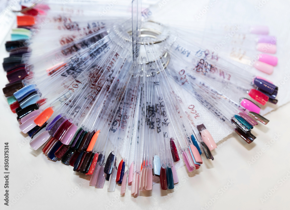 Nails variety samples for manicure. The color of Polish for manicure