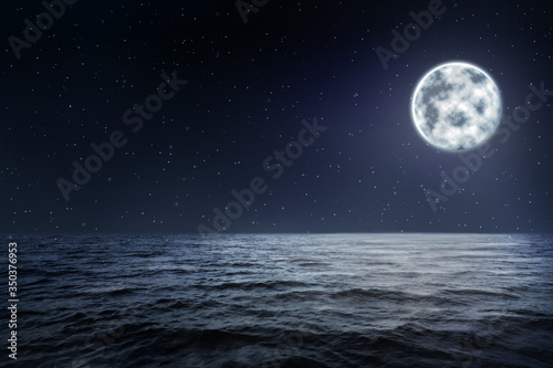 Beautiful seascape with full moon in night sky