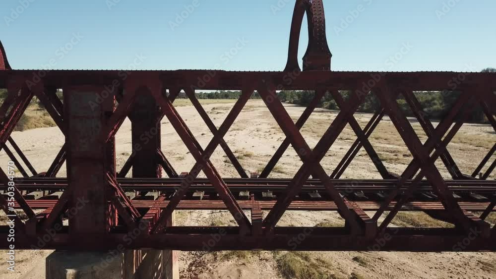 4K aerial drone video view of historical railway bridge on main B6 road from Windhoek to Gobabis near settlement Seeis in central highland Khomas Hochland of Namibia, southern Africa 4K aerial drone video view of historical railway bridge on main B6 road from Windhoek to Gobabis near settlement Seeis in central highland Khomas Hochland of Namibia, southern Africa