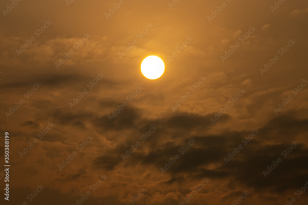 The beautiful background image of the sunrise when entering on a cloudy day makes the sky look dark and gloomy.