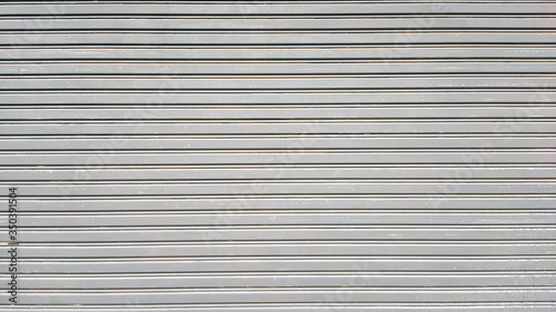 Gray Corrugated metal or zinc texture surface or galvanize steel in the vertical line background or texture