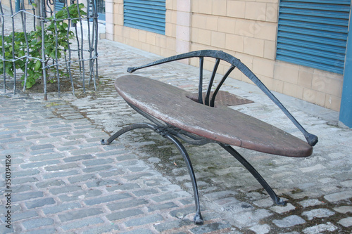 a bench made with wood and metal