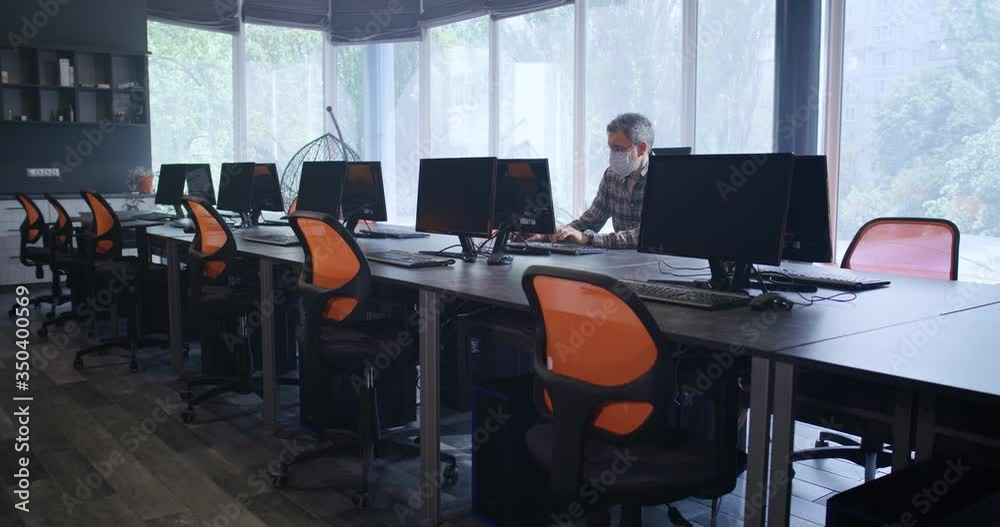 Man working in office alone