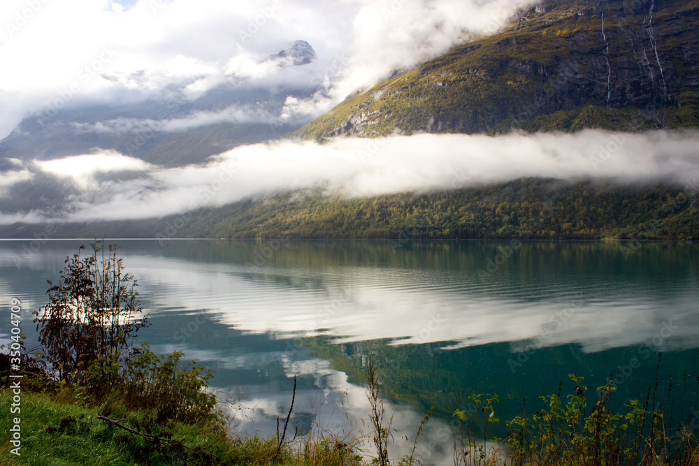 Beautiful norwegian landscape in autumn near Loen and Stryn in Norway.Lake with turquoise water surruonded by mountains.Lovatnet in autumn,photo for printing on calendar,poster,wallpaper,postcard Beautiful norwegian landscape in autumn near Loen and Stryn in Norway.Lake with turquoise water surruonded by mountains.Lovatnet in autumn,photo for printing on calendar,poster,wallpaper,postcard
