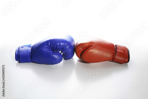 Boxing gloves in red and blue © ImageHit