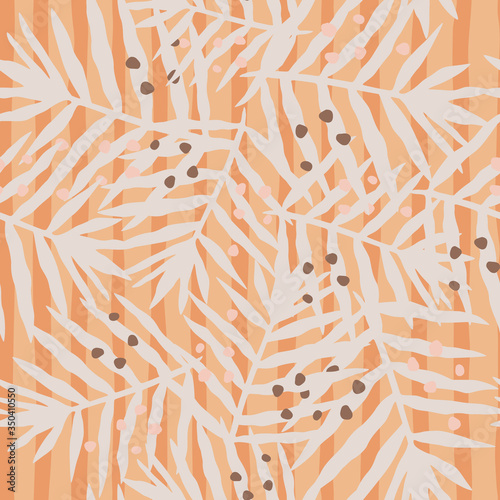 Palm leaf seamless pattern on stripes background. Exotic tropical fern leaves endless backfrop. Modern jungle foliage wallpaper.