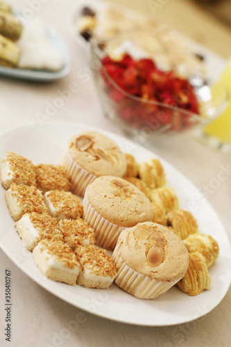 Traditional cookies and cupcakes on a plate