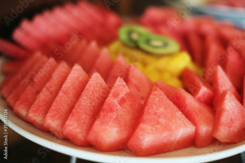 Watermelon and other fruits on a plate