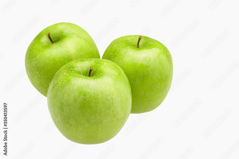 Green apples with water droplets Green apples with water droplets